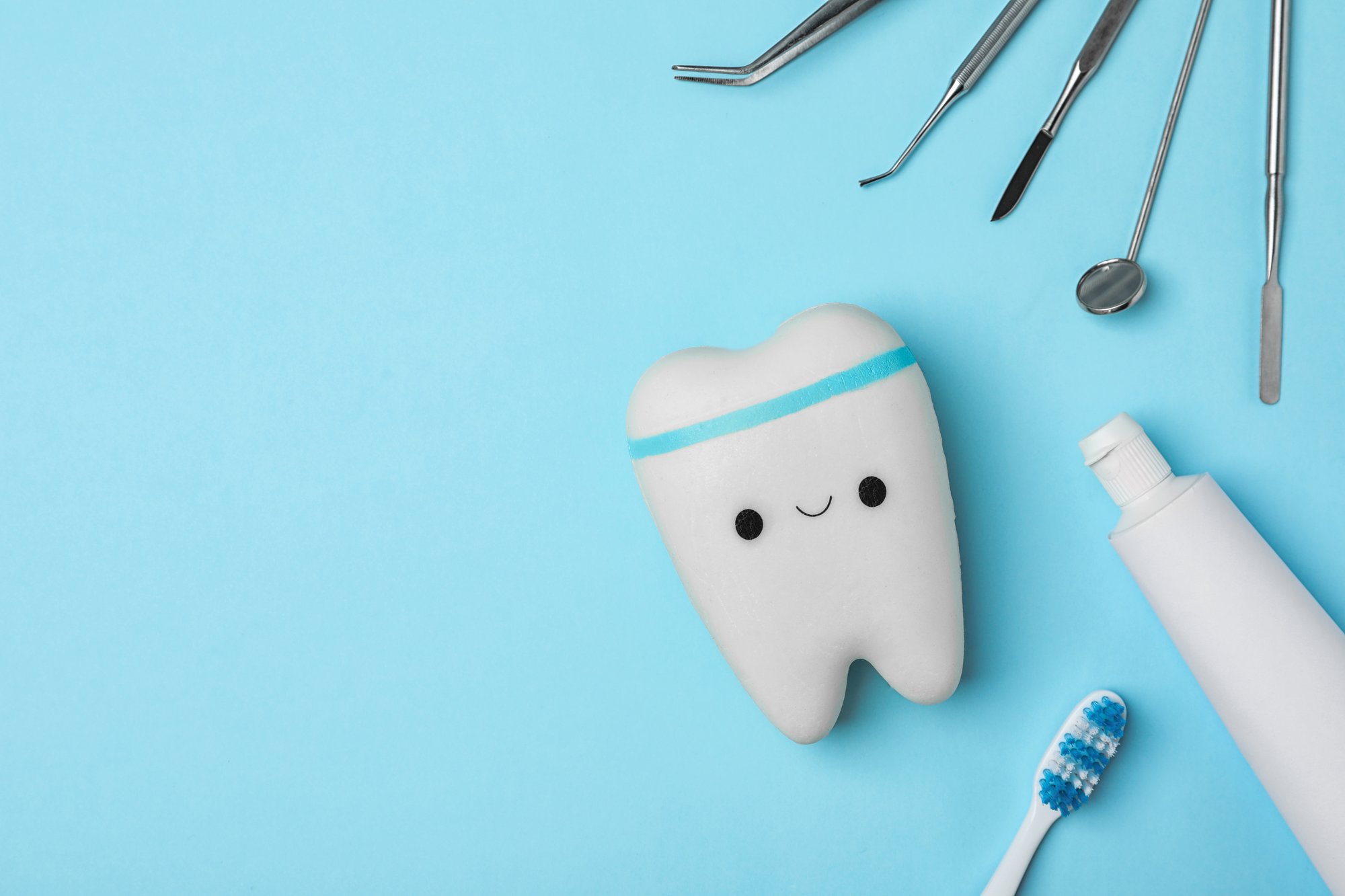 Dentist examining a patient's teeth during a routine dental checkup